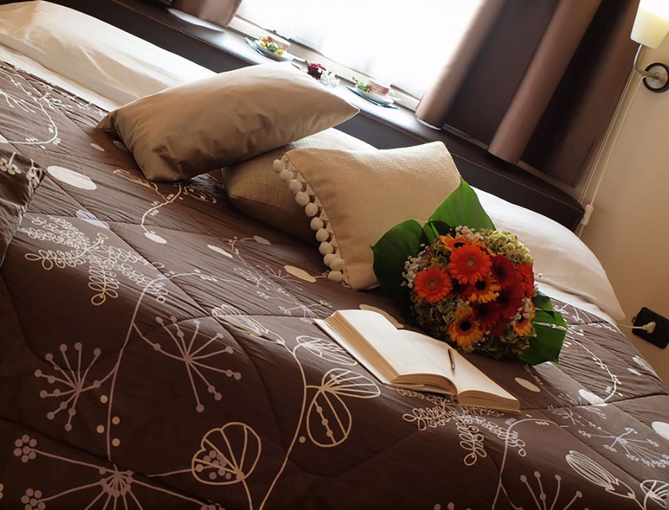 Family Quadruple Room, 1 Bedroom, Private Bathroom | Premium bedding, minibar, desk, laptop workspace