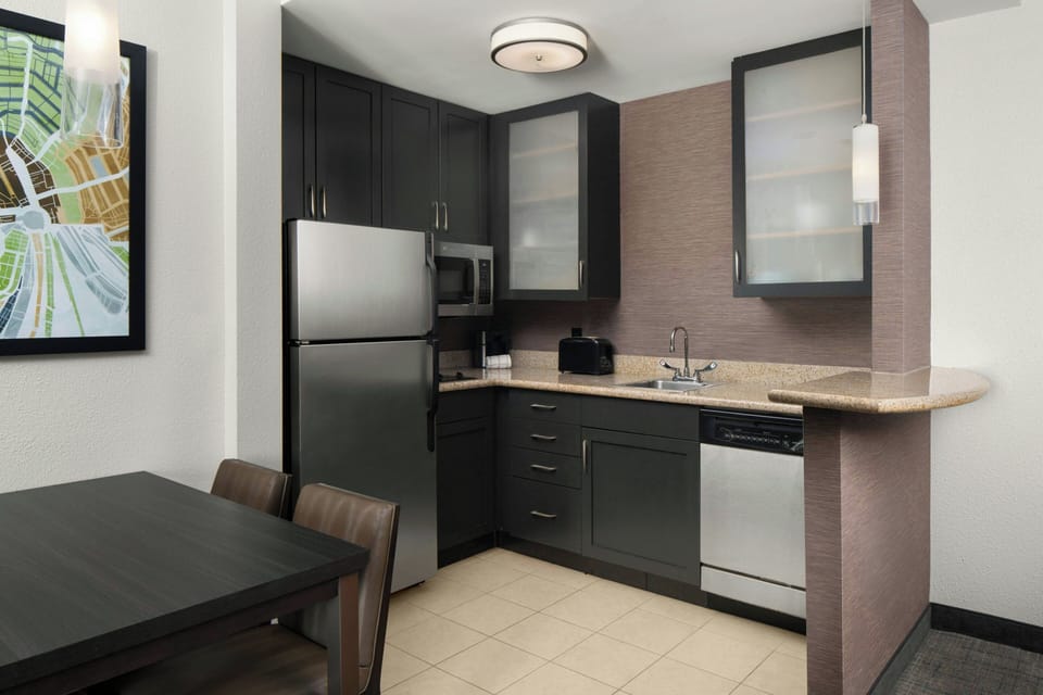 Full-size fridge, microwave, stovetop, dishwasher