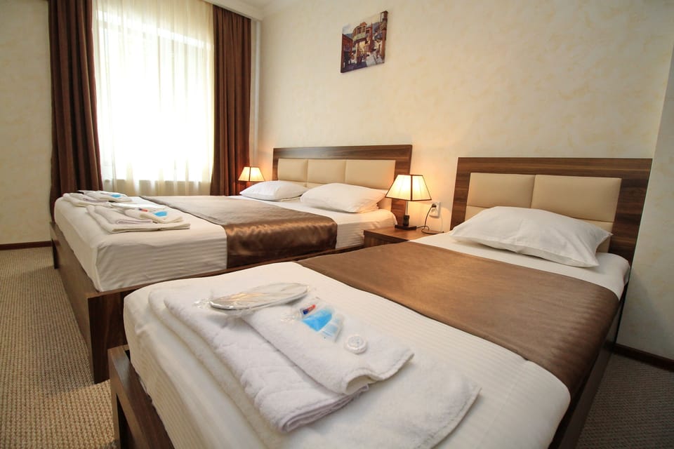 Family Triple Room, 1 Bedroom | Premium bedding, pillowtop beds, minibar, individually decorated