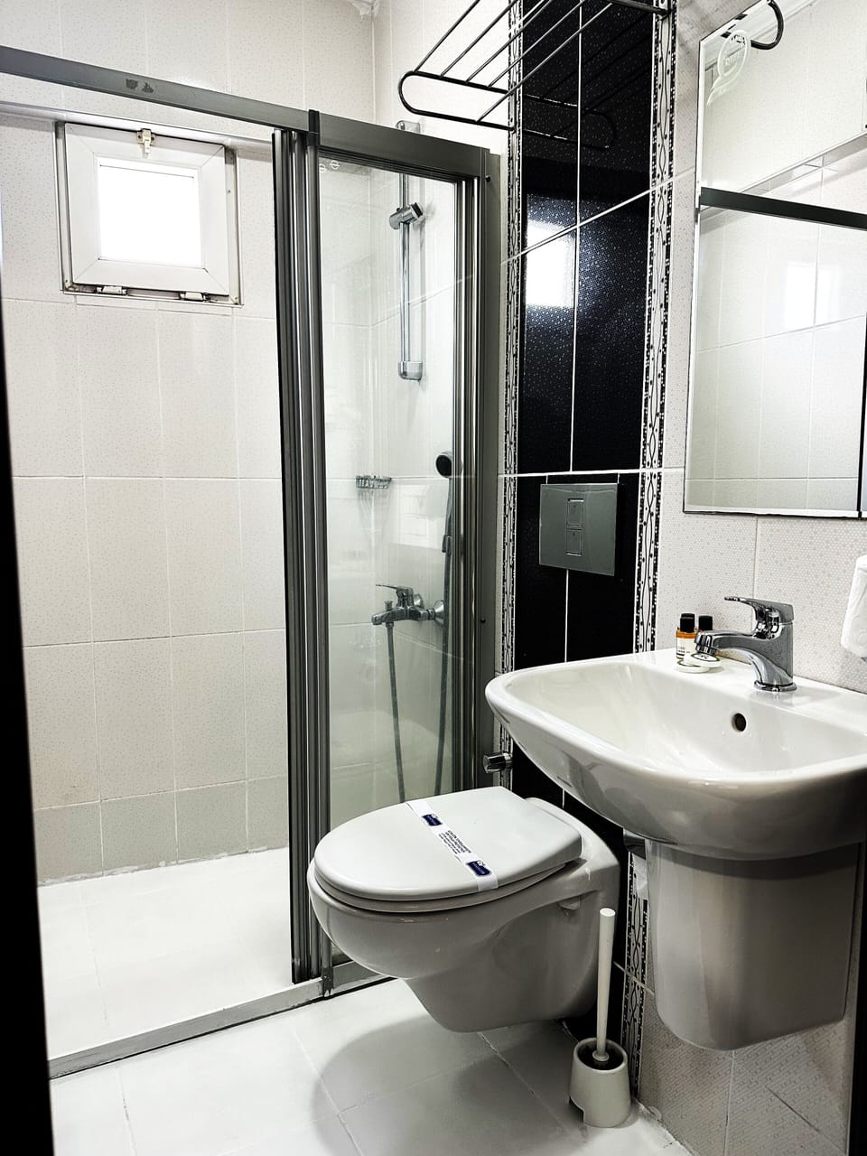 Shower, free toiletries, hair dryer, slippers