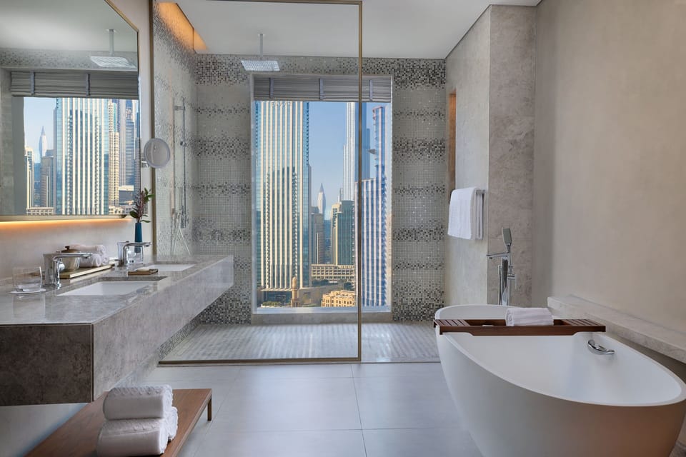 Deluxe Suite, 1 King Bed, Smoking (View) | Bathroom | Separate tub and shower, deep soaking tub, rainfall showerhead