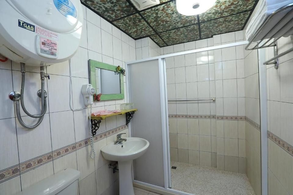 Superior Quadruple Room, Balcony | Bathroom | Shower, free toiletries, hair dryer, slippers