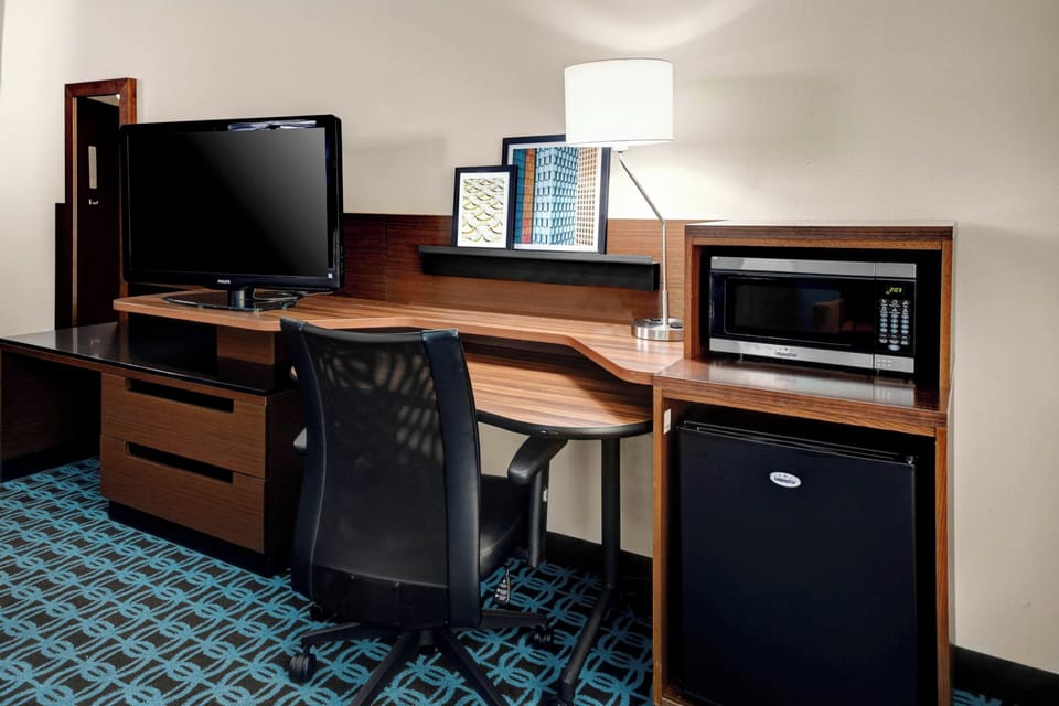 Desk, blackout drapes, iron/ironing board, cribs (free)