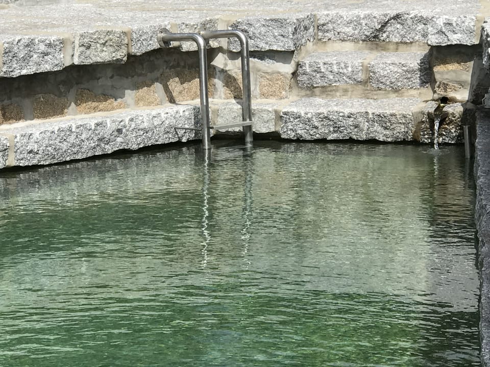 Outdoor pool, an infinity pool, sun loungers