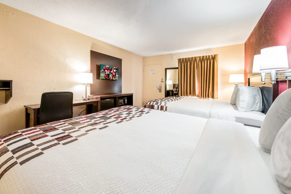 Desk, blackout drapes, free cribs/infant beds, free WiFi