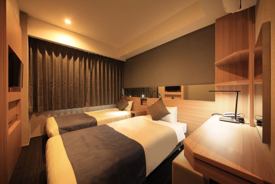 Desk, blackout drapes, soundproofing, iron/ironing board