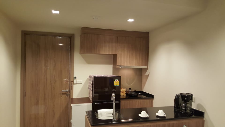 Apartment, 1 Bedroom, Poolside | Private kitchen | Coffee/tea maker, fridge, microwave, stovetop