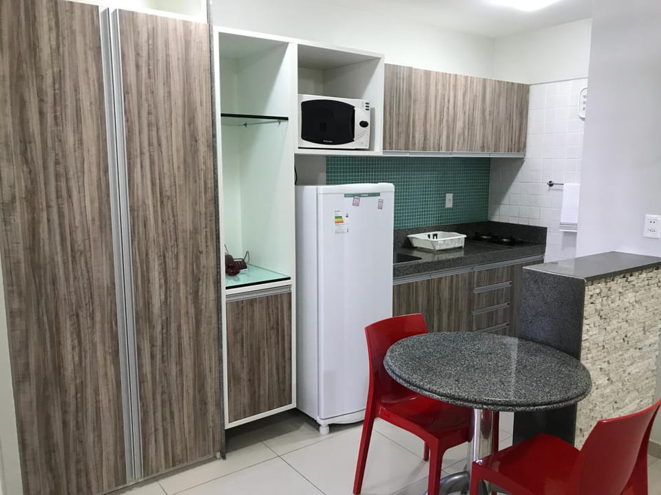 Fridge, microwave, stovetop, cookware/dishes/utensils