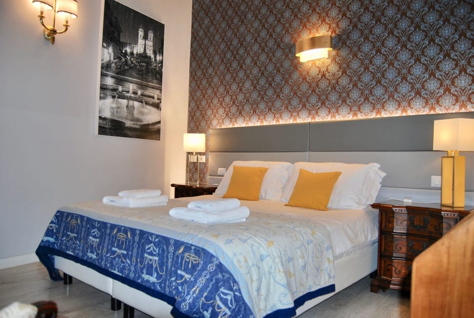 Deluxe Suite (Queen) | Premium bedding, in-room safe, blackout drapes, iron/ironing board