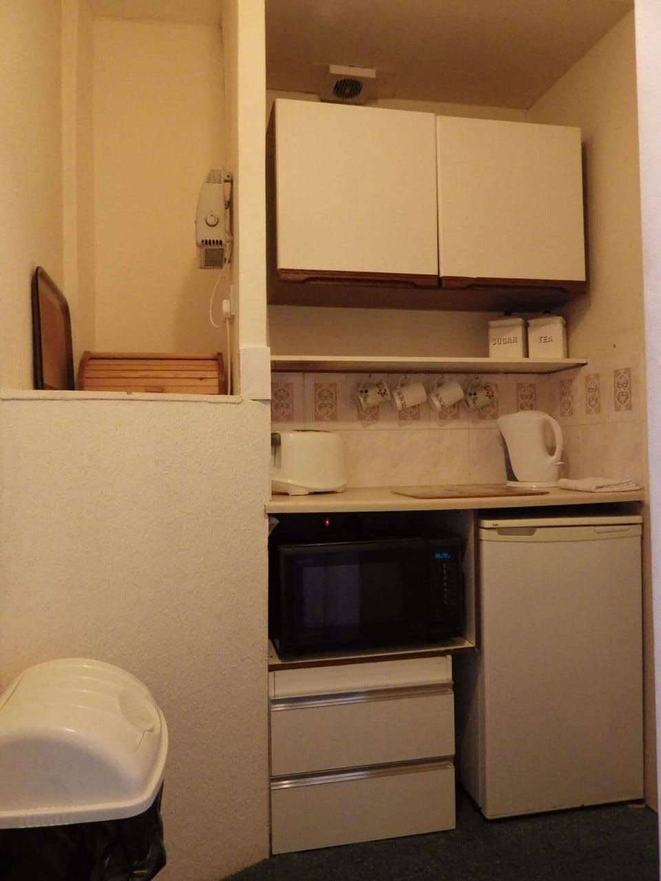 Microwave, coffee/tea maker, cookware/dishes/utensils