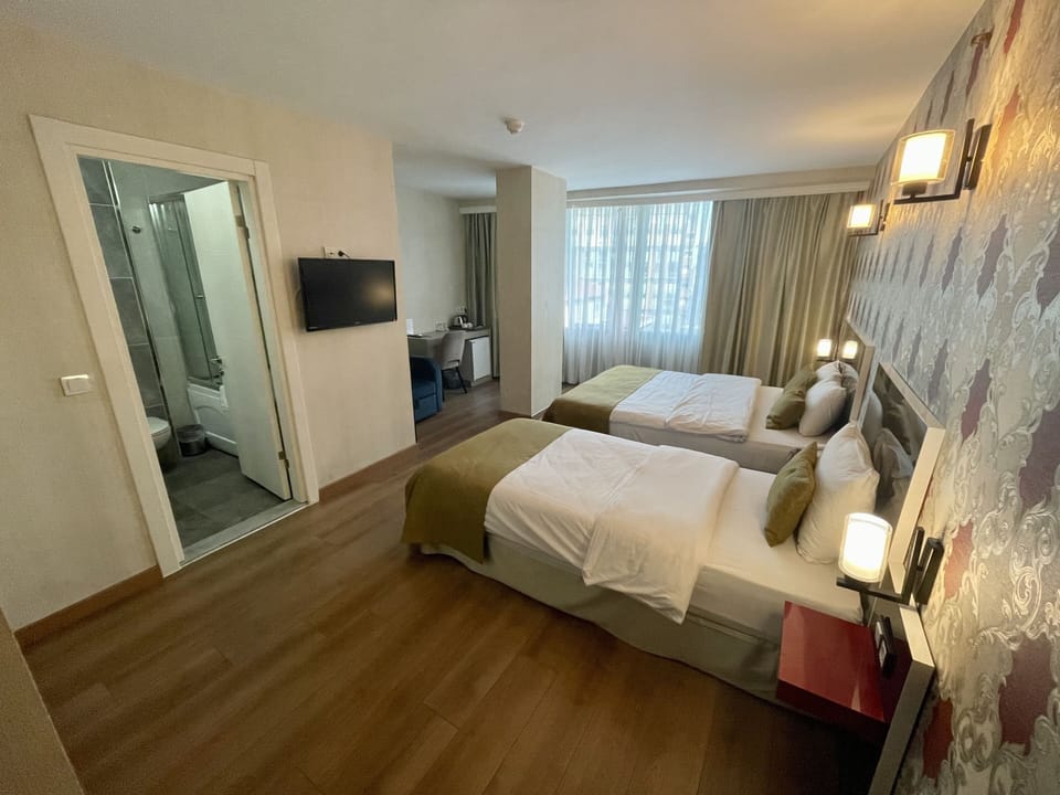 Deluxe Triple Room | Premium bedding, minibar, in-room safe, soundproofing