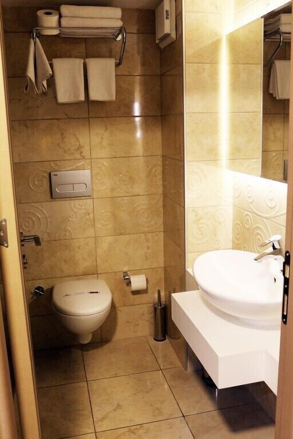 Shower, free toiletries, hair dryer, slippers