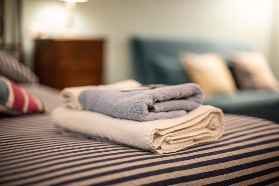 Deluxe Triple Room, Multiple Beds, Private Bathroom | In-room safe, desk, iron/ironing board, free WiFi