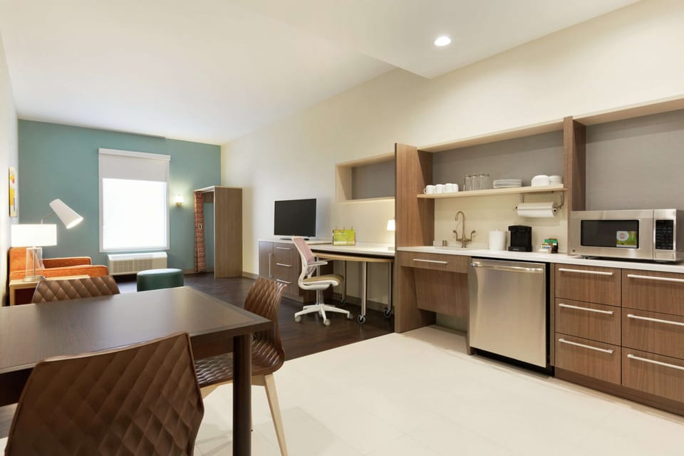 Hypo-allergenic bedding, pillowtop beds, desk, laptop workspace