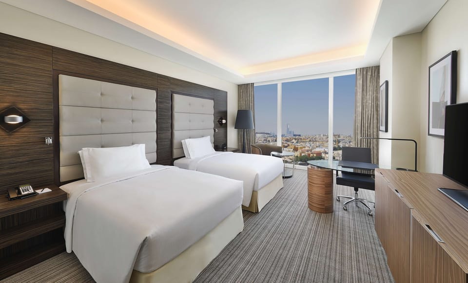 Deluxe Suite, 1 Bedroom | In-room safe, desk, blackout drapes, soundproofing
