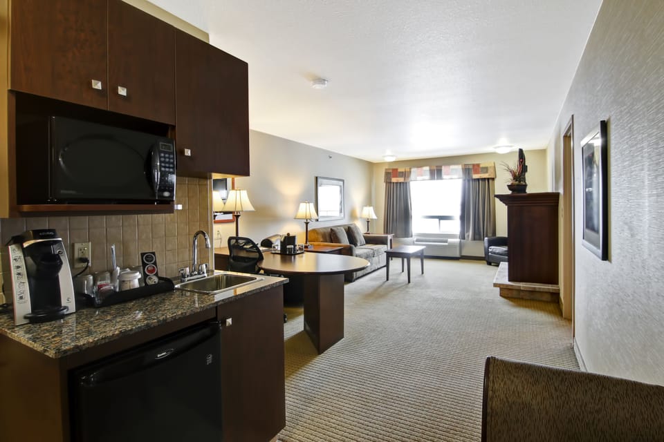 Desk, iron/ironing board, cribs (free), WiFi (free)