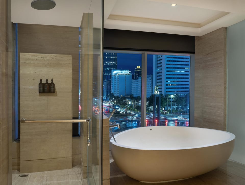Separate tub and shower, deep soaking tub, eco-friendly toiletries