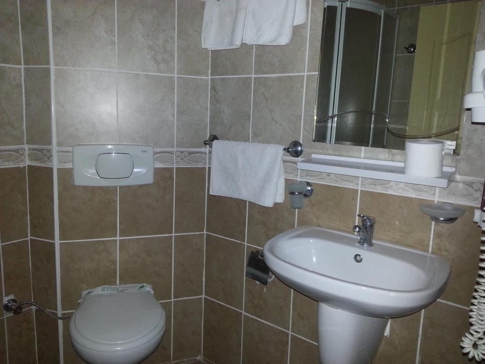 Free toiletries, hair dryer, slippers, towels
