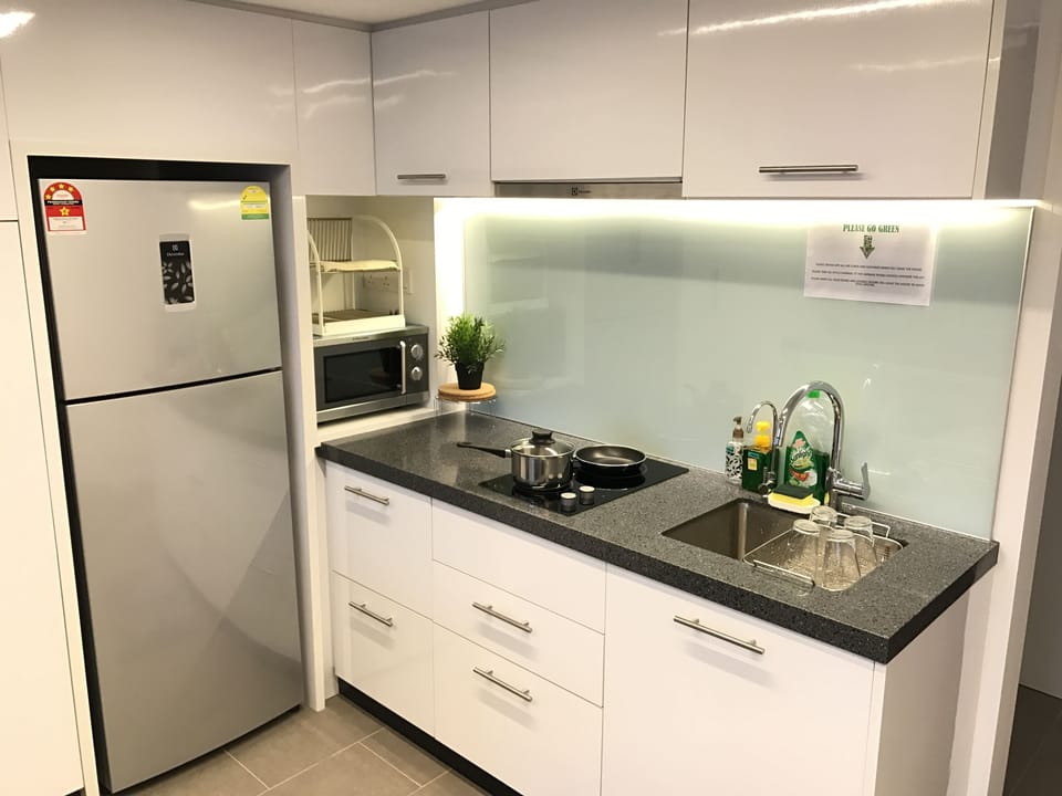 Full-size fridge, microwave, stovetop, electric kettle