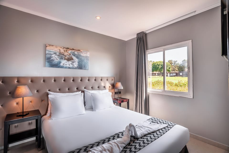 Superior Condo, Sea View | In-room safe, desk, iron/ironing board, bed sheets