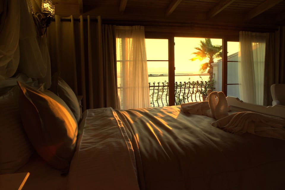 Deluxe Double Room, Balcony, Sea View | Premium bedding, minibar, in-room safe, iron/ironing board