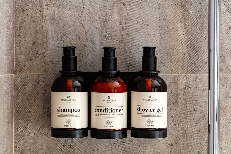 Shower, eco-friendly toiletries, hair dryer, towels