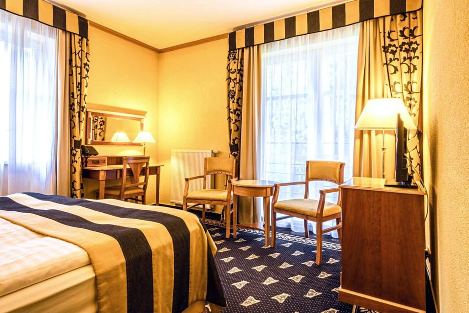 Double or Twin Room | Minibar, desk, blackout drapes, free cribs/infant beds