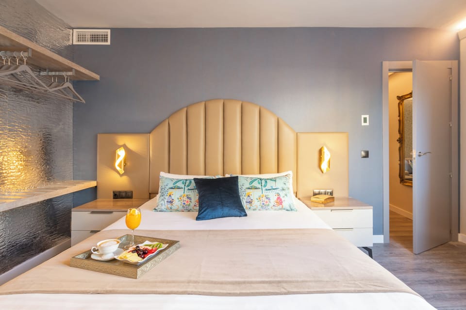 Apartment, 1 Bedroom, City View | 1 bedroom, down comforters, desk, travel crib