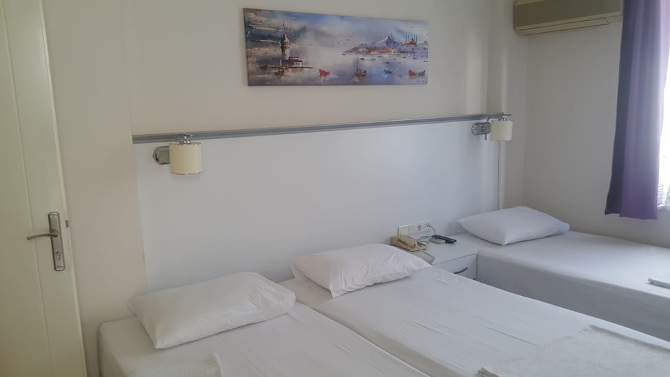Triple Room, Balcony | 1 bedroom, premium bedding, in-room safe, laptop workspace
