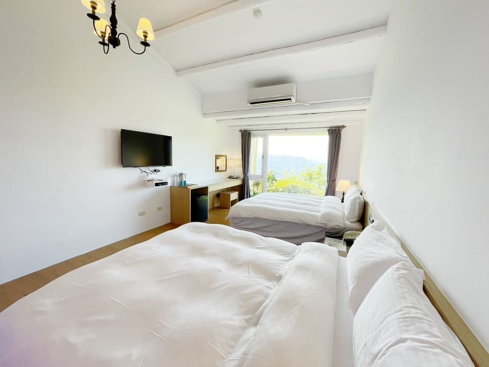 Standard Quadruple Room | Premium bedding, blackout drapes, free WiFi, bed sheets