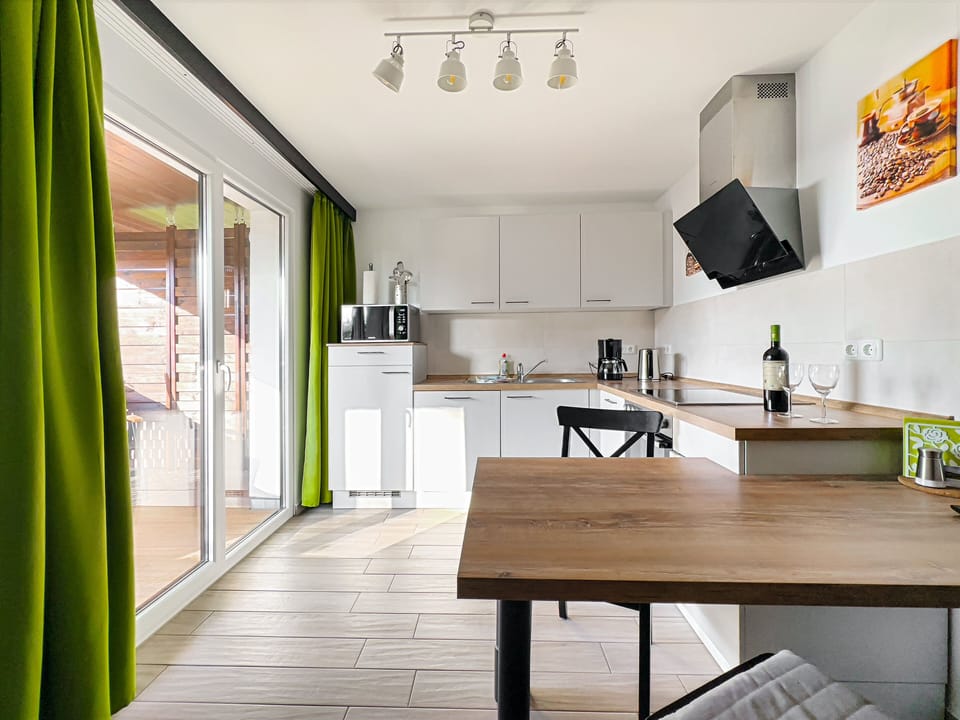 Apartment (9) | Private kitchen | Coffee/tea maker, full-size fridge, microwave, oven