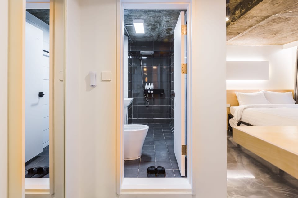 Basic Triple Room, Multiple Beds (Foreigner Only) | Bathroom | Shower, free toiletries, hair dryer, slippers