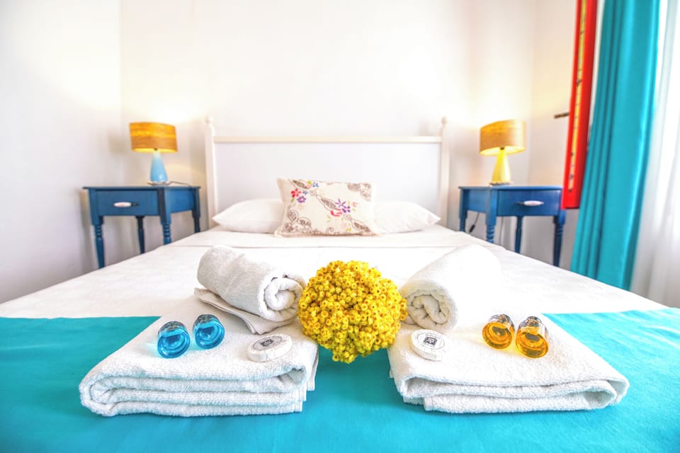Premium bedding, laptop workspace, free WiFi, bed sheets
