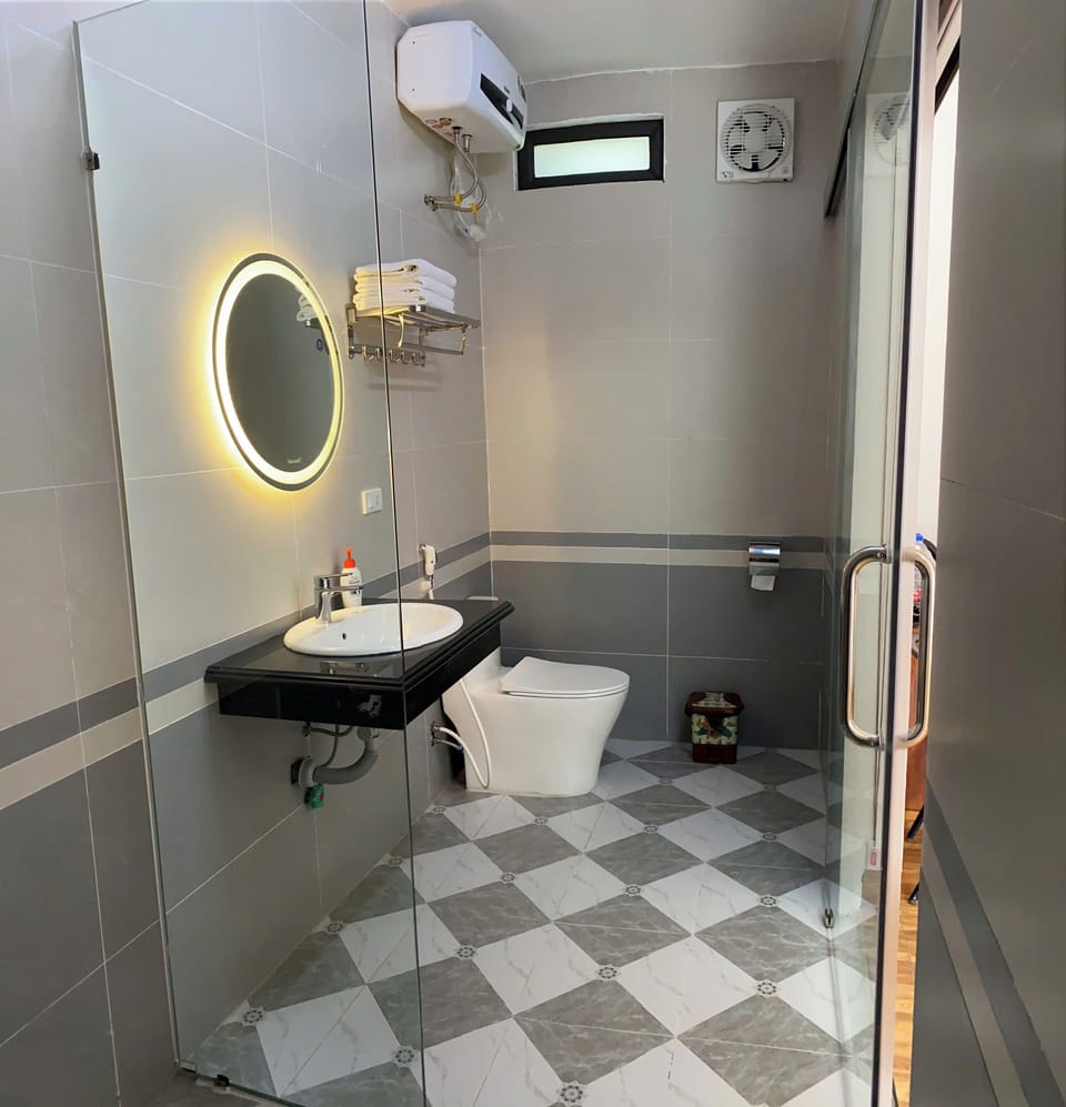 Shower, rainfall showerhead, designer toiletries, hair dryer
