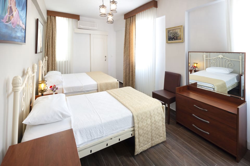 Deluxe Triple Room | Premium bedding, minibar, desk, free WiFi