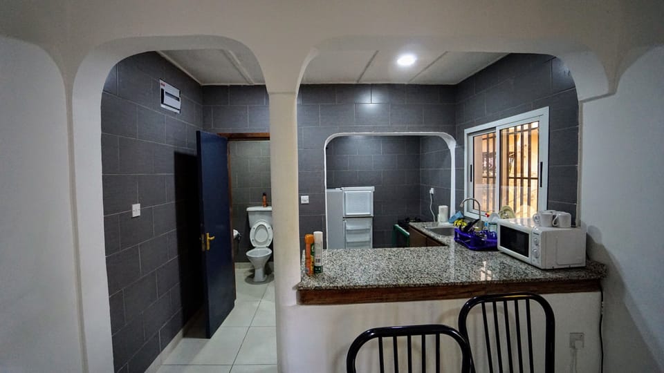 Apartment, Pool View | Living area | Flat-screen TV