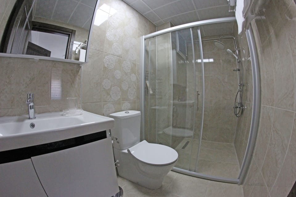 Shower, free toiletries, hair dryer, towels