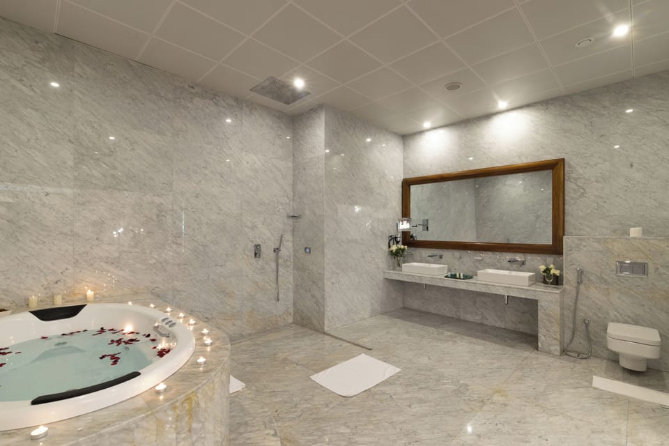 Royal Suite, Multiple Beds, Golf View | Bathroom | Spring water tub, free toiletries, bathrobes, slippers