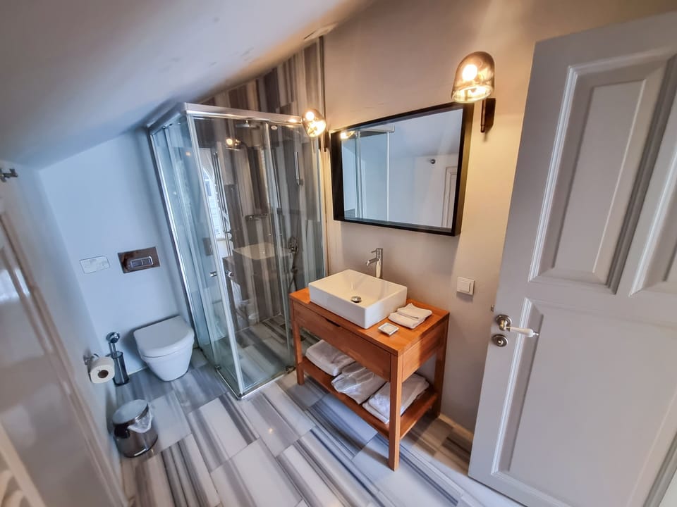 Suite, Balcony, Sea View | Minibar, iron/ironing board, free WiFi, bed sheets