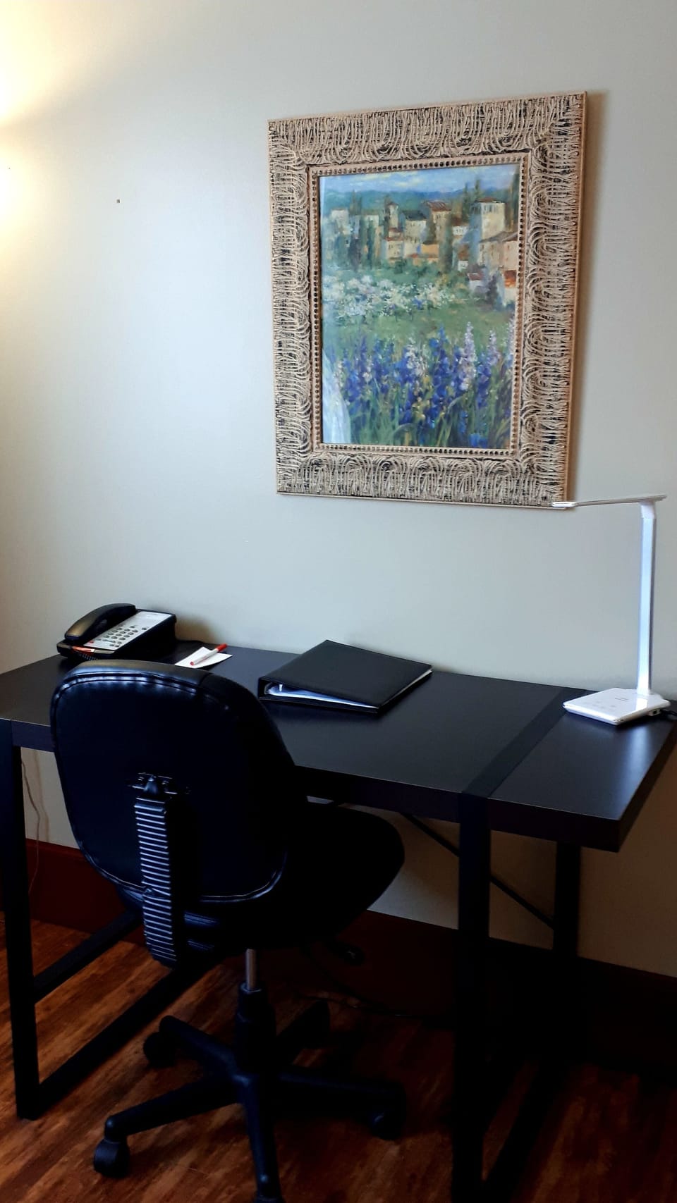 Premium bedding, desk, laptop workspace, blackout drapes
