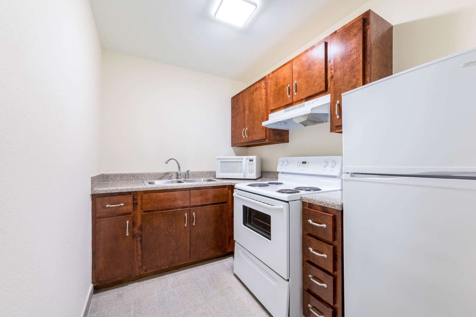 Suite, 1 King Bed with Sofa bed, Non Smoking (Efficiency) | Desk, blackout drapes, iron/ironing board, free WiFi