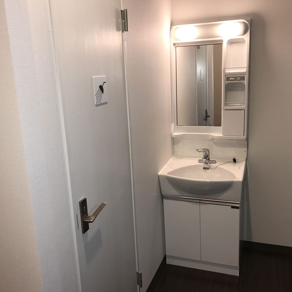 Shower, hair dryer, slippers, bidet