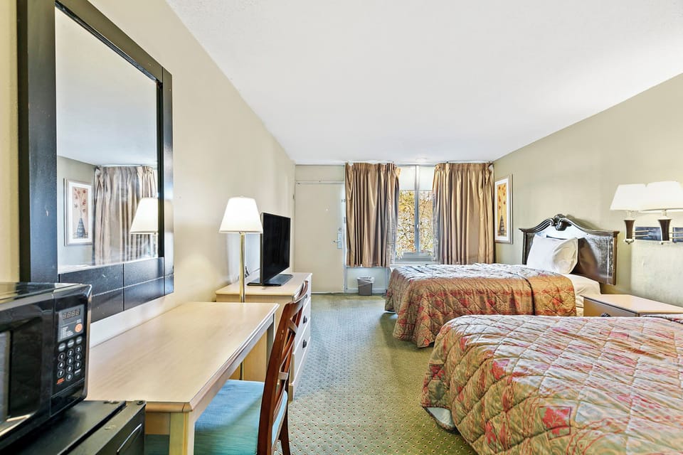 Room, 2 Queen Beds, Non Smoking | Desk, high-speed internet, bed sheets