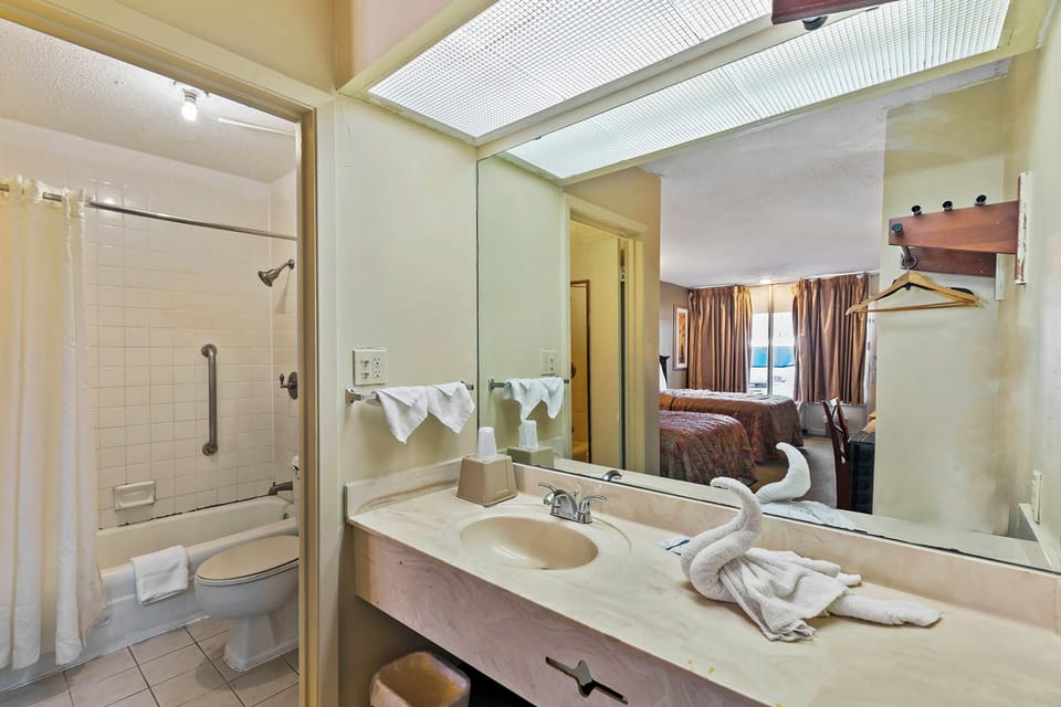 Room, 2 Queen Beds, Non Smoking | Bathroom | Free toiletries, towels