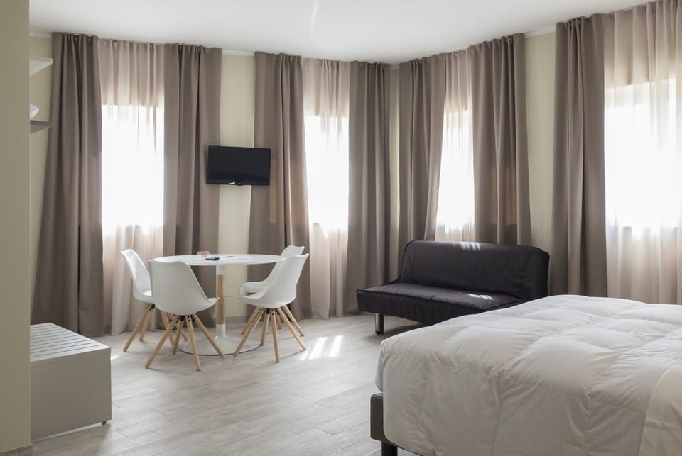 Down comforters, memory foam beds, desk, blackout drapes