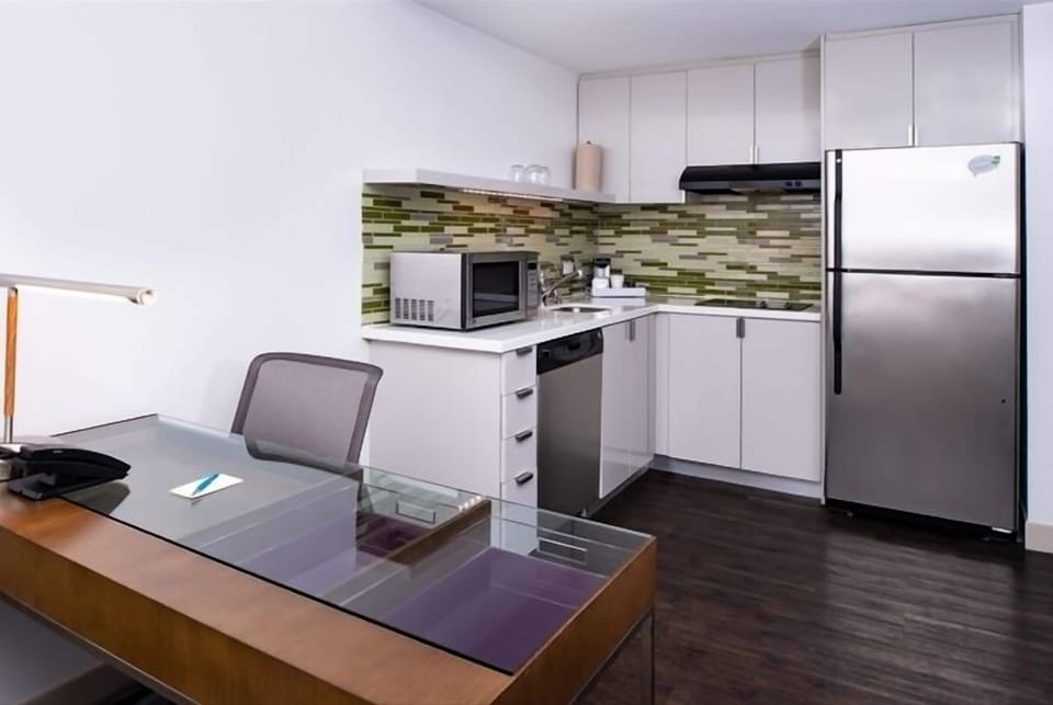 Fridge, microwave, stovetop, coffee/tea maker
