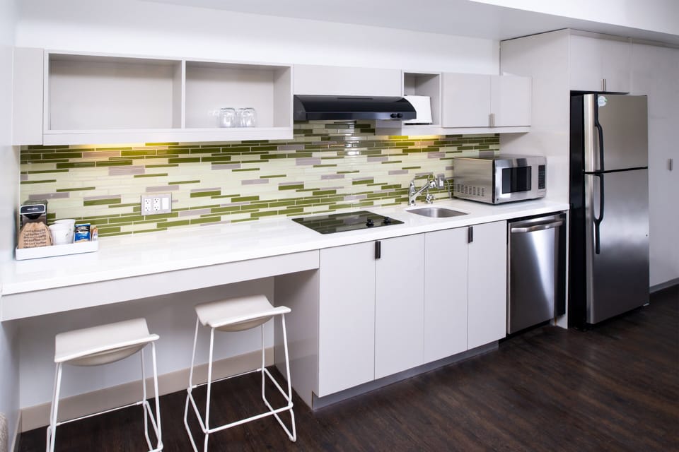 Fridge, microwave, stovetop, coffee/tea maker