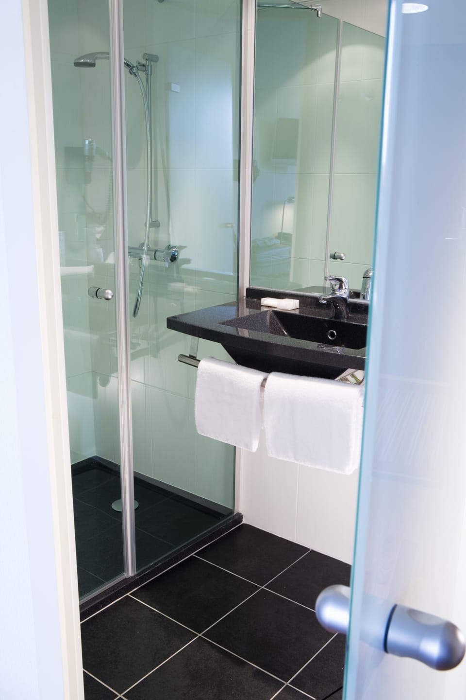 Shower, free toiletries, hair dryer, towels