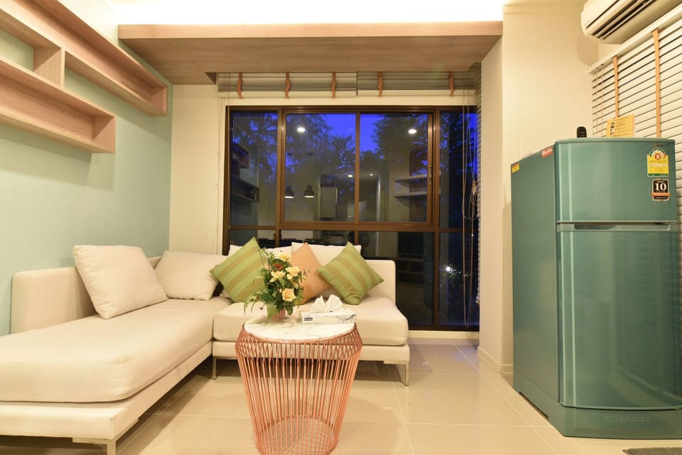 2 Bedroom Apartment | Living area | Flat-screen TV