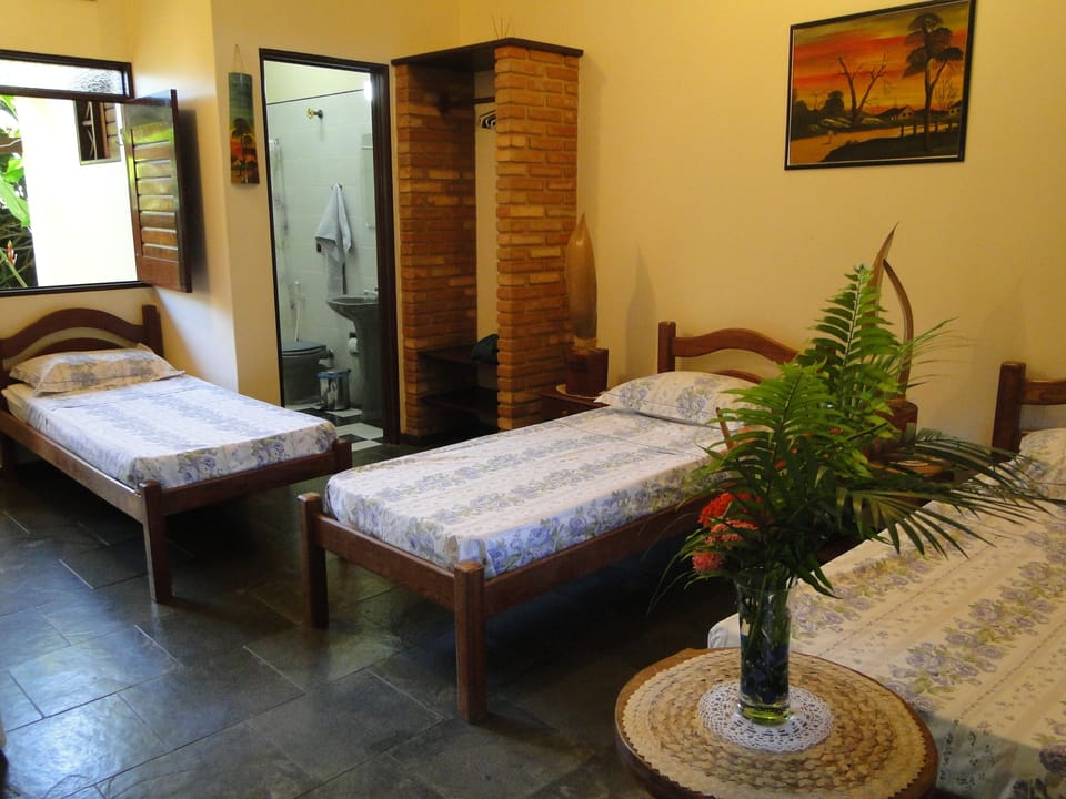 Twin Room, Ground Floor | Minibar, individually decorated, desk, laptop workspace